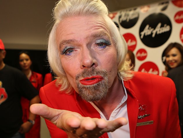 stewardess-richard-branson-serves-passengers-20130511-180648-085.jpg